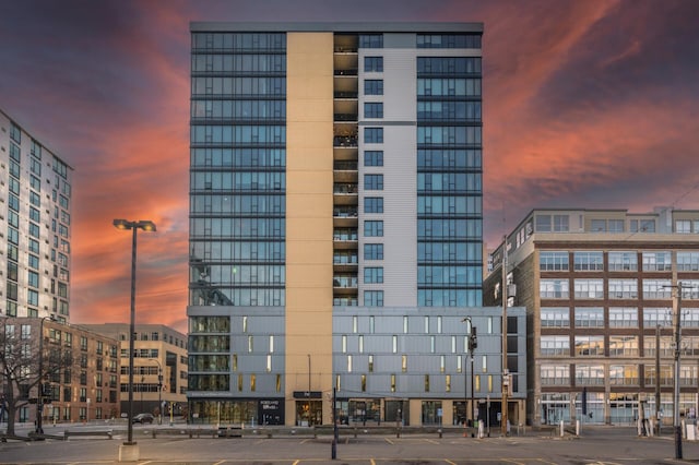 view of outdoor building at dusk