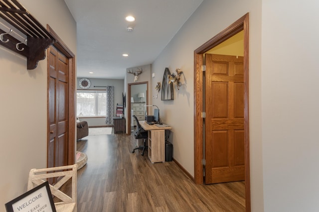 hall with wood-type flooring