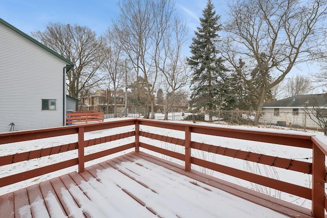 view of snow covered deck