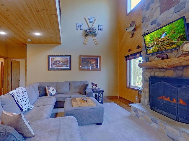 16694 206th Cir, Hutchinson, MN 55350 - living area featuring a high ceiling, plenty of natural light, wood walls, a fireplace, and recessed lighting
