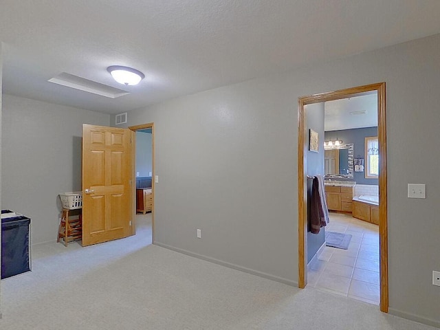 16694 206th Cir, Hutchinson, MN 55350 - empty room featuring light carpet, a chandelier, and baseboards