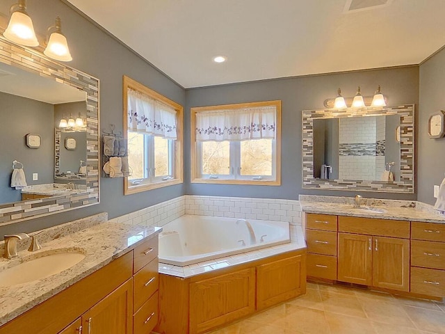 16694 206th Cir, Hutchinson, MN 55350 - bathroom featuring tile patterned flooring, a bath, and two vanities