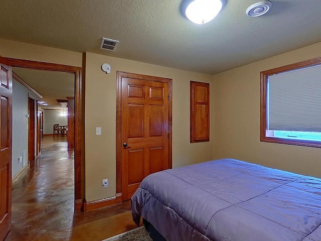 16694 206th Cir, Hutchinson, MN 55350 - bedroom with baseboards and a textured ceiling