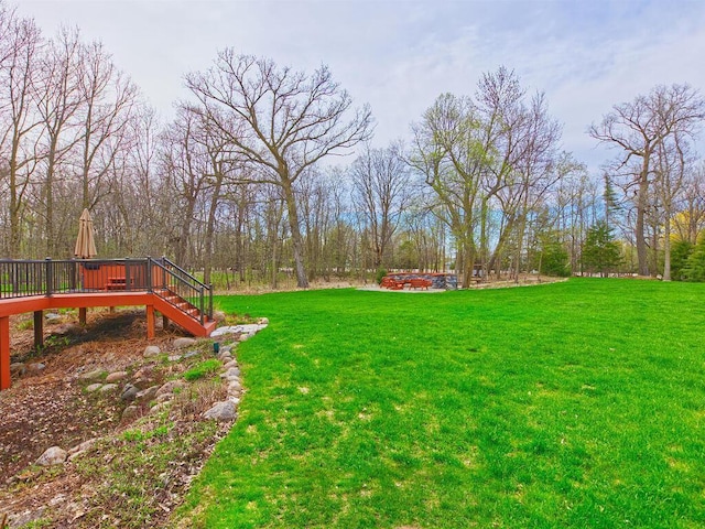 16694 206th Cir, Hutchinson, MN 55350 - view of grassy yard with a deck and stairs