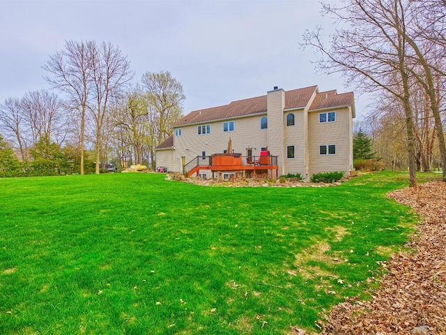 16694 206th Cir, Hutchinson, MN 55350 - rear view of property with a chimney, a lawn, and a wooden deck