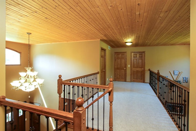 16694 206th Cir, Hutchinson, MN 55350 - corridor featuring an upstairs landing, a chandelier, wood ceiling, and carpet