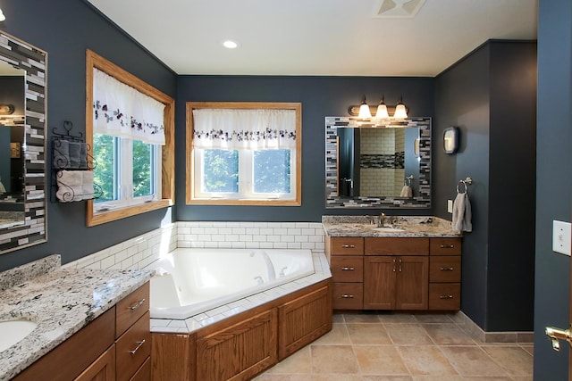 16694 206th Cir, Hutchinson, MN 55350 - full bathroom featuring two vanities, a bath, tile patterned flooring, and tiled shower