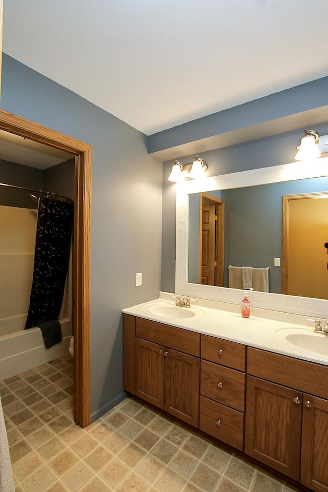 16694 206th Cir, Hutchinson, MN 55350 - bathroom featuring double vanity, shower / bath combo, and tile patterned floors
