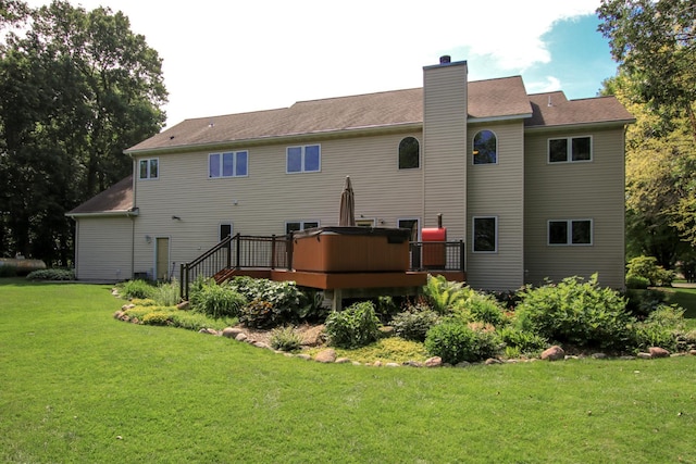 16694 206th Cir, Hutchinson, MN 55350 - back of house with a wooden deck, a yard, and a chimney