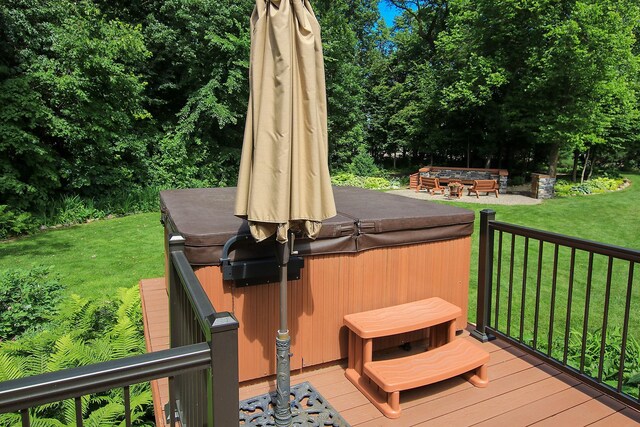16694 206th Cir, Hutchinson, MN 55350 - deck with a hot tub and a lawn