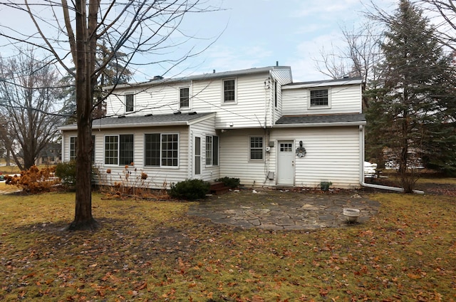 back of house featuring a patio area