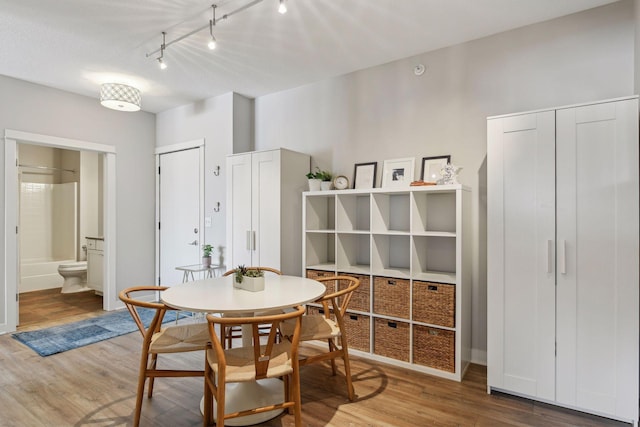 dining room with hardwood / wood-style floors