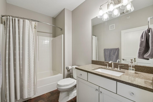 full bathroom with tile patterned floors, vanity, toilet, and shower / bath combo