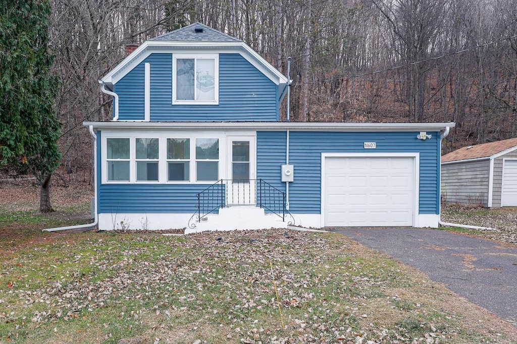 front of property featuring a garage