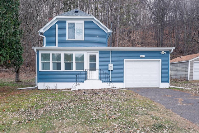 front of property featuring a garage