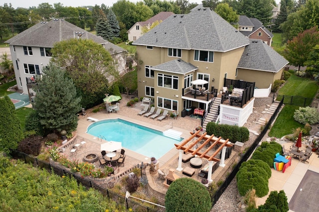 view of pool with a patio and an outdoor living space