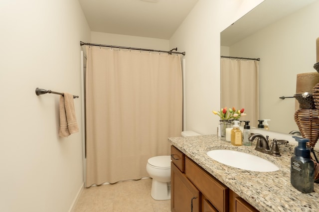 bathroom featuring a shower with curtain, vanity, and toilet