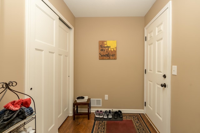 doorway featuring dark hardwood / wood-style flooring