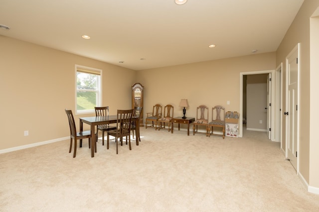 view of carpeted dining space