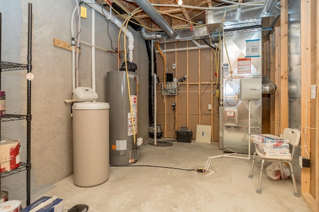 utility room featuring heating unit and water heater