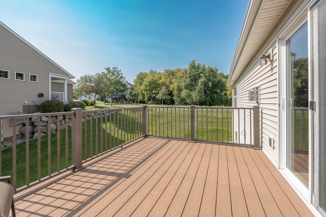 deck featuring a yard