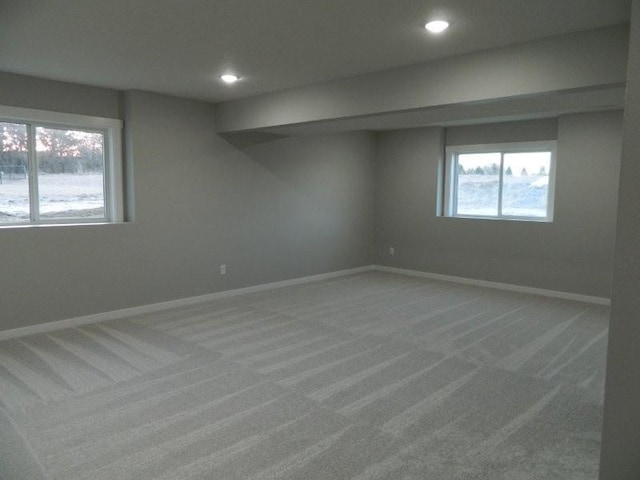 unfurnished room featuring carpet