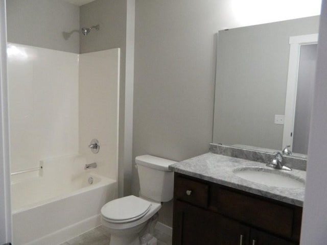 full bathroom with vanity, tile patterned flooring, toilet, and washtub / shower combination