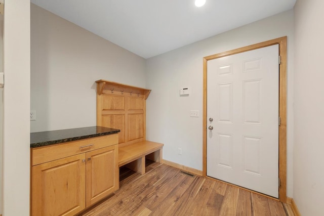 1939 Legacy Dr, Faribault, MN 55021 - mudroom with light wood-type flooring, baseboards, and recessed lighting