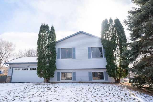 view of front of property featuring a garage