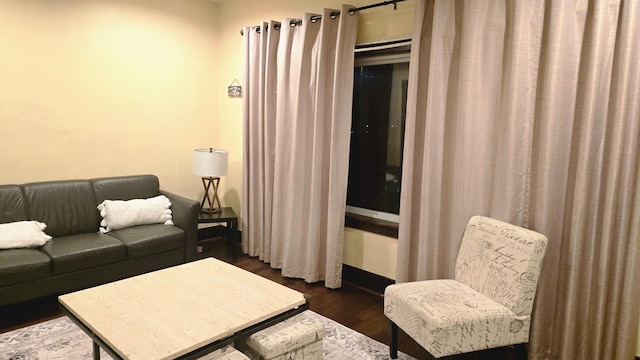 living room with dark hardwood / wood-style floors