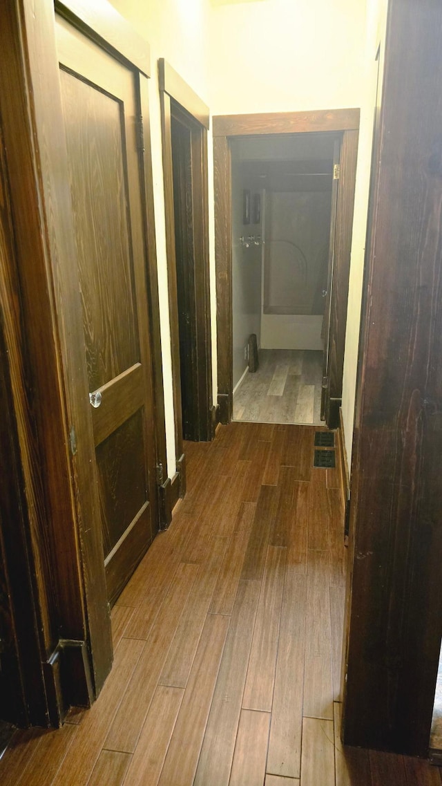 hallway with light wood-type flooring