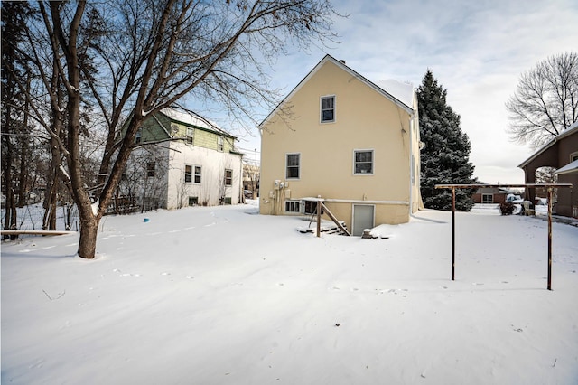 view of snow covered property