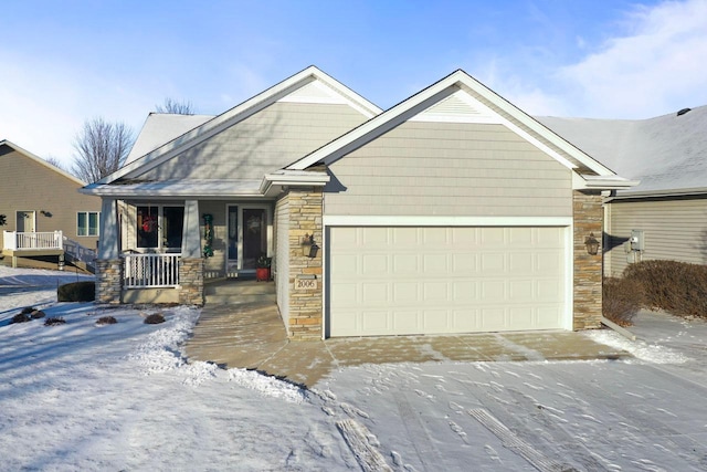 view of front facade featuring a porch and a garage