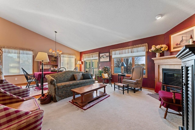 carpeted living room featuring lofted ceiling, an inviting chandelier, a tiled fireplace, and a textured ceiling