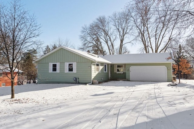 ranch-style house featuring a garage