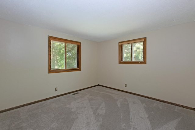 view of carpeted spare room