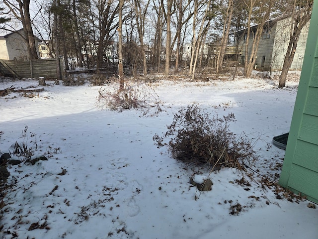 view of yard covered in snow