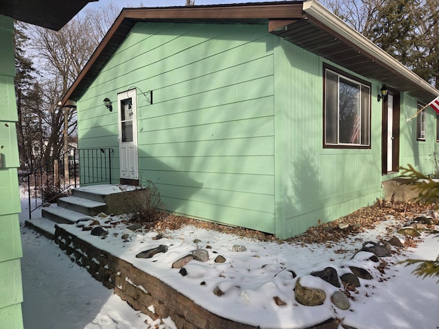 view of snow covered property