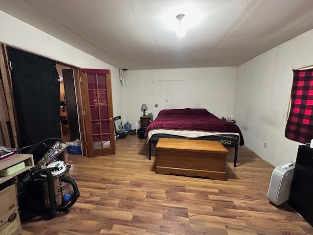 bedroom featuring hardwood / wood-style floors