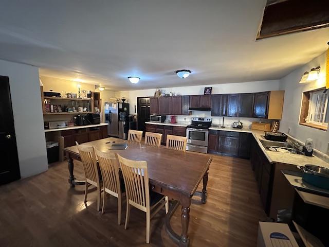 3579 Rodgers Ave E, Eagles Nest Twp, MN 55731 - dining room with dark wood finished floors