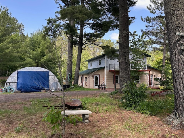 3579 Rodgers Ave E, Eagles Nest Twp, MN 55731 - view of yard featuring an outdoor structure
