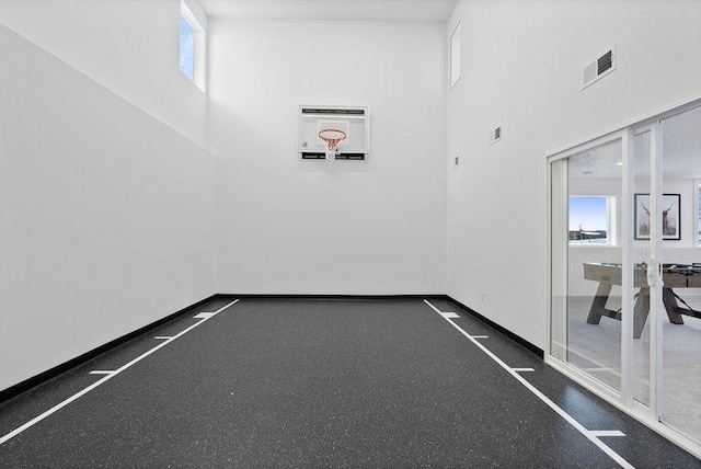 view of basketball court featuring a wealth of natural light