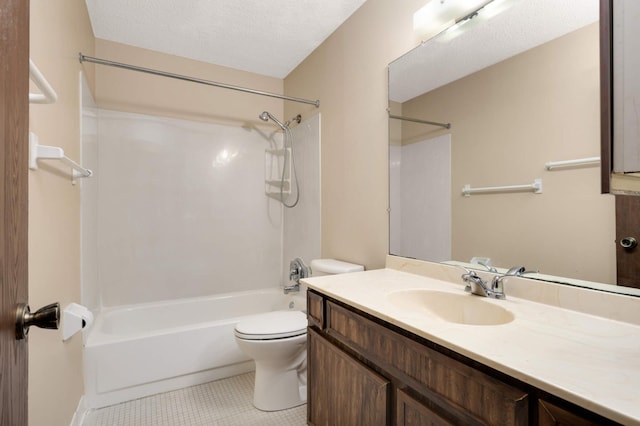 full bathroom with bathtub / shower combination, toilet, vanity, tile patterned floors, and a textured ceiling