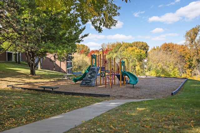 view of jungle gym with a lawn