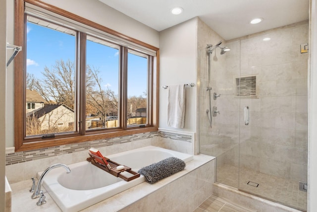 bathroom with independent shower and bath