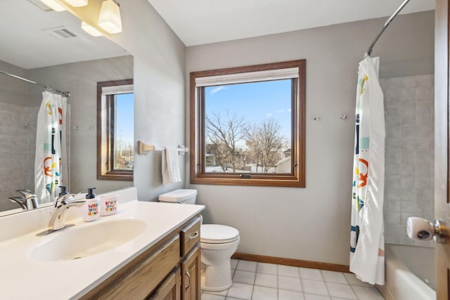 full bathroom featuring shower / tub combo with curtain, vanity, toilet, and tile patterned floors