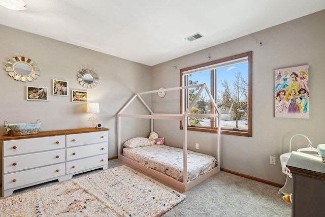 bedroom featuring light colored carpet