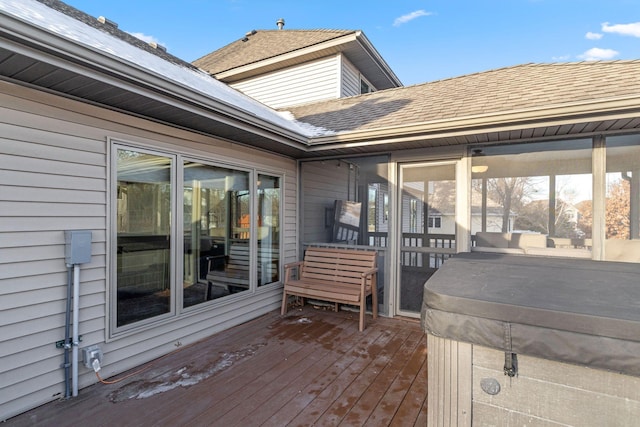 deck featuring a hot tub