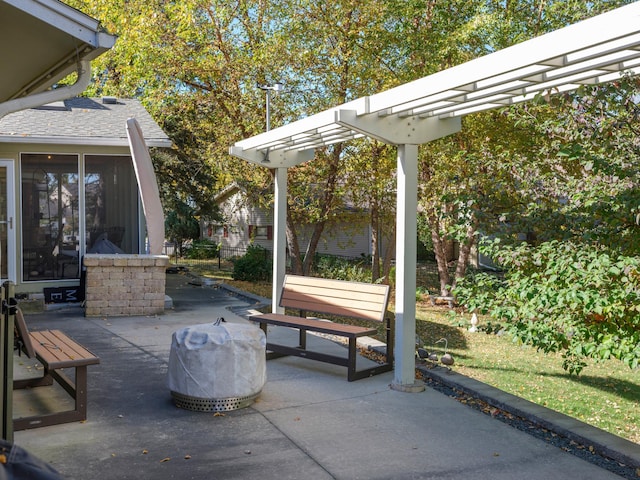 view of patio featuring a pergola