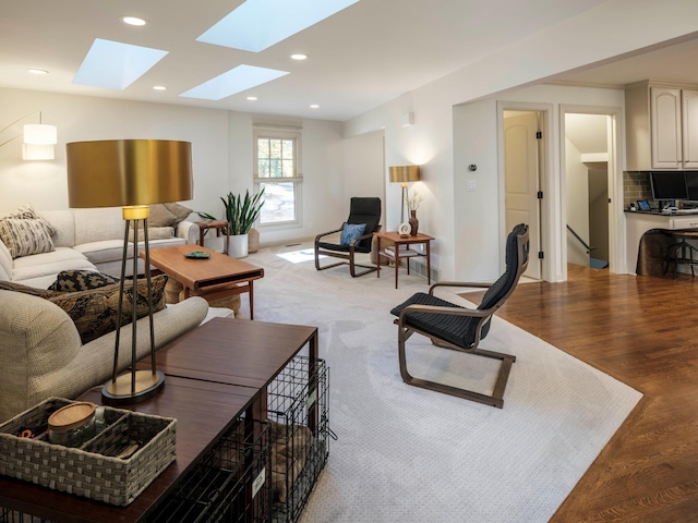 living room with light hardwood / wood-style floors